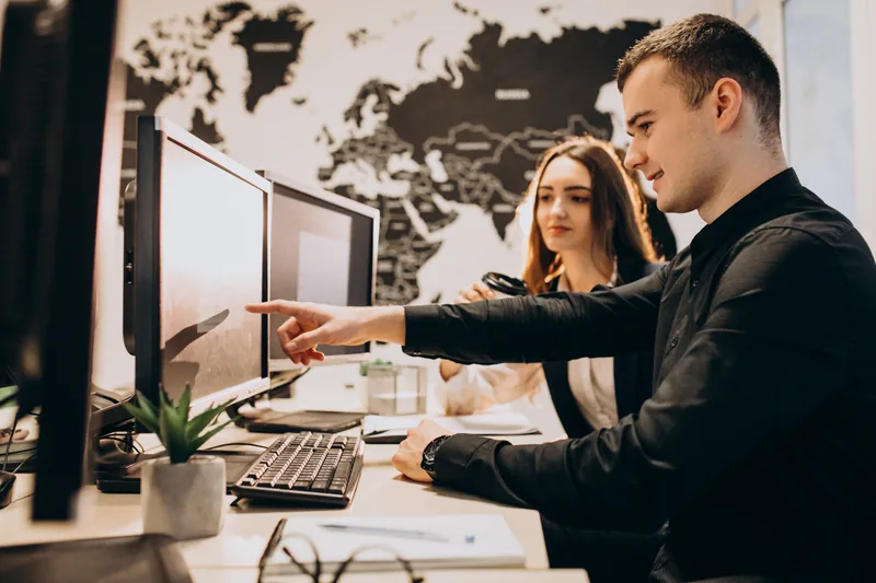 IT company workers working on computers